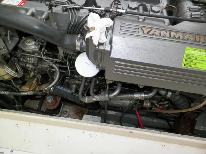 Termo Yacht Photos Pics Engine compartment of a 2000 Custom Holland Hardtop Cruiser with Yanmar components.