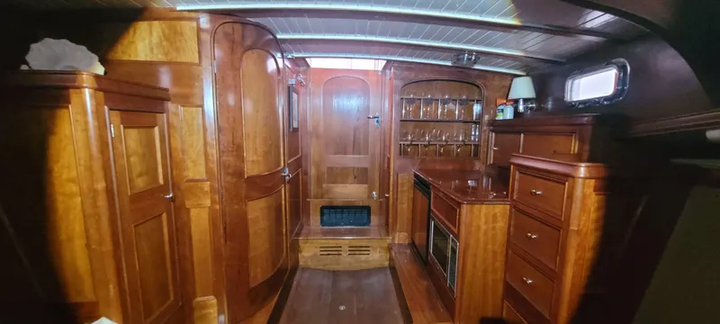 Termo Yacht Photos Pics Luxurious wooden interior of a 2000 Custom Holland Hardtop Cruiser yacht cabin.