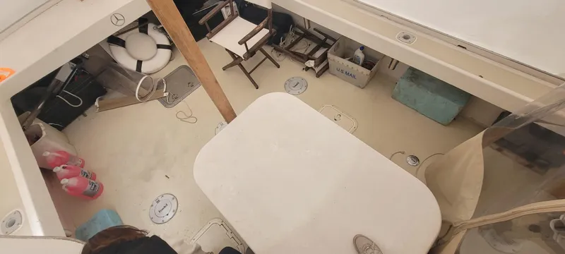 Termo Yacht Photos Pics Interior of 2000 Custom Holland Hardtop Cruiser with seating and storage areas.