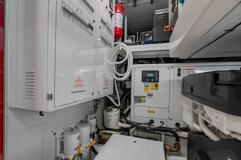 Firefly Yacht Photos Pics Engine room of 2025 Sanlorenzo SX76 yacht with control panels and equipment.