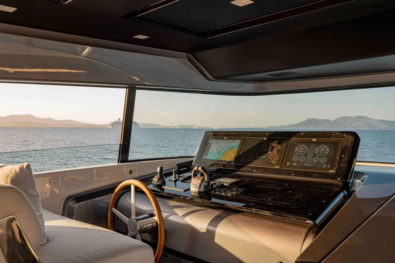 Firefly Yacht Photos Pics Luxurious 2025 Sanlorenzo SX76 yacht helm with panoramic sea view.