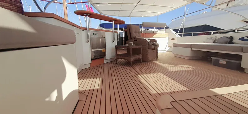 An Yacht Photos Pics Luxurious 1997 Vitters Motoryacht deck with seating and canopy.