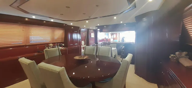 An Yacht Photos Pics Luxurious interior of a 1997 Vitters motoryacht with elegant dining area and polished wood finishes.