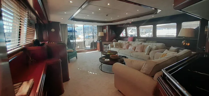 An Yacht Photos Pics Luxurious interior of a 1997 Vitters Motoryacht with elegant seating and panoramic windows.