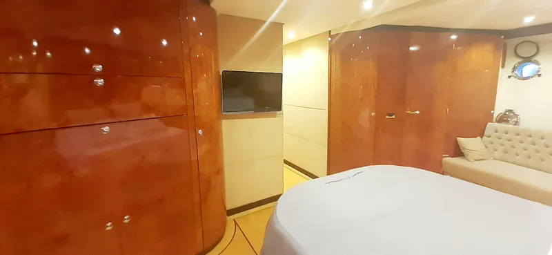 An Yacht Photos Pics Luxurious 1997 Vitters Motoryacht interior with polished wood cabinets and modern amenities.