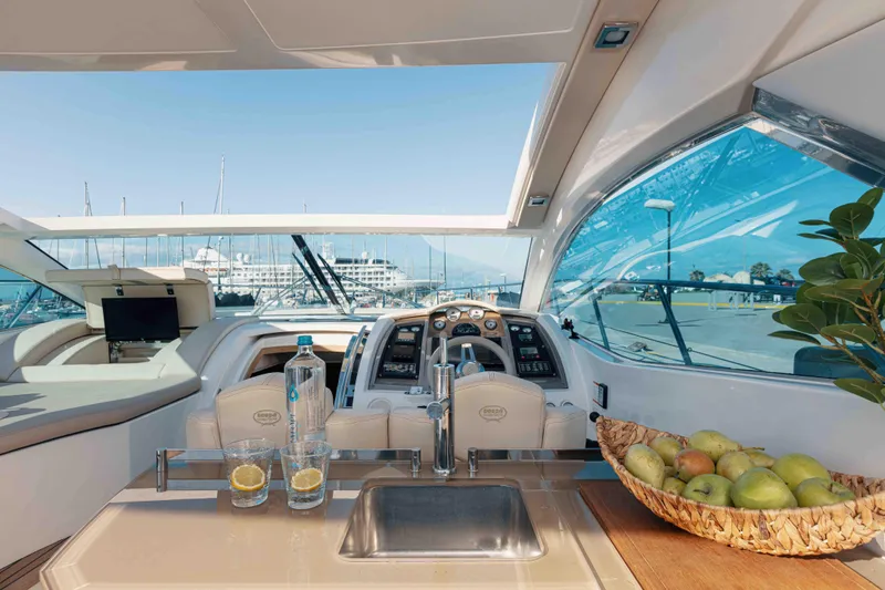  Yacht Photos Pics Luxurious 2008 Sessa Marine C46 yacht interior with modern amenities and scenic marina view.