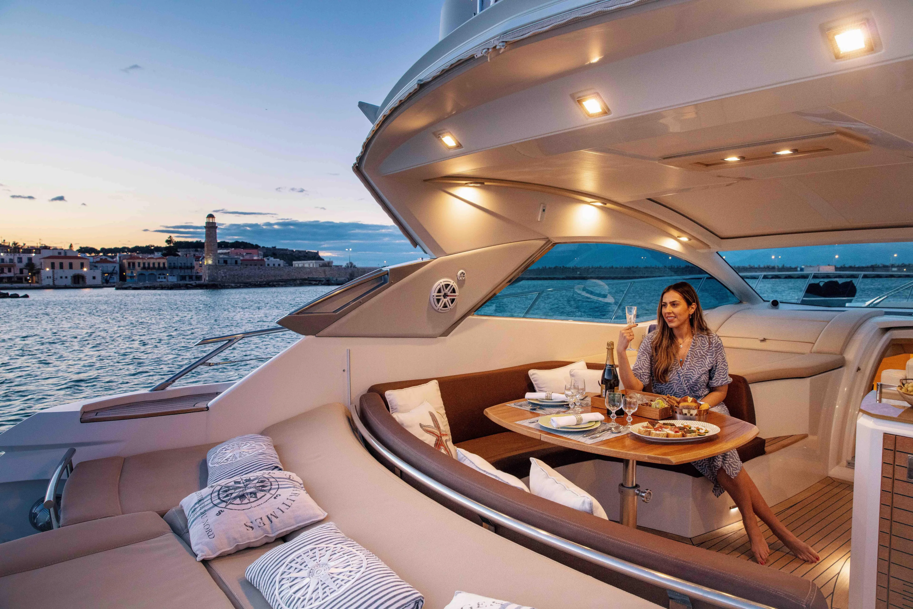  Yacht Photos Pics Luxurious 2008 Sessa Marine C46 yacht with elegant dining setup at sunset.