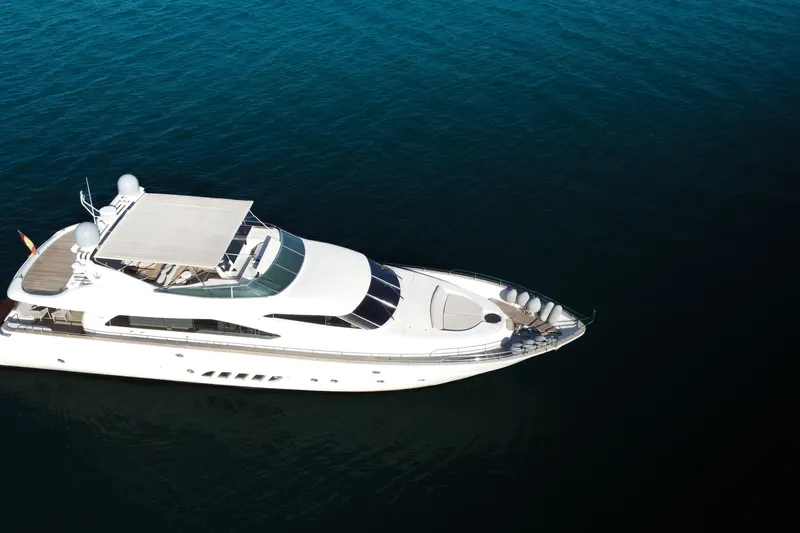 My Way Victoria Yacht Photos Pics Luxury yacht Dominator 860 Fly, 2007 model, cruising on calm blue waters.