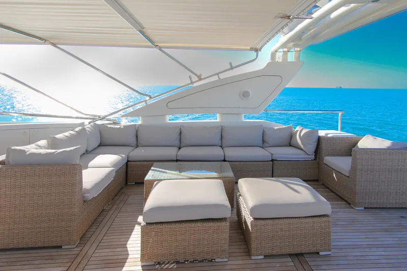 My Way Victoria Yacht Photos Pics Luxurious outdoor seating on 2007 Dominator 860 Fly yacht with ocean view.