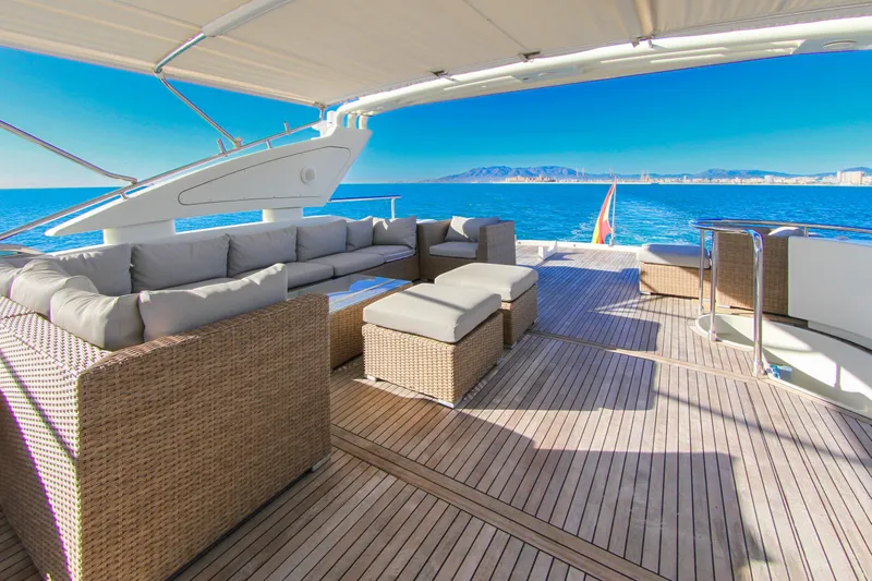 My Way Victoria Yacht Photos Pics Luxurious 2007 Dominator 860 Fly yacht deck with elegant seating and ocean view.