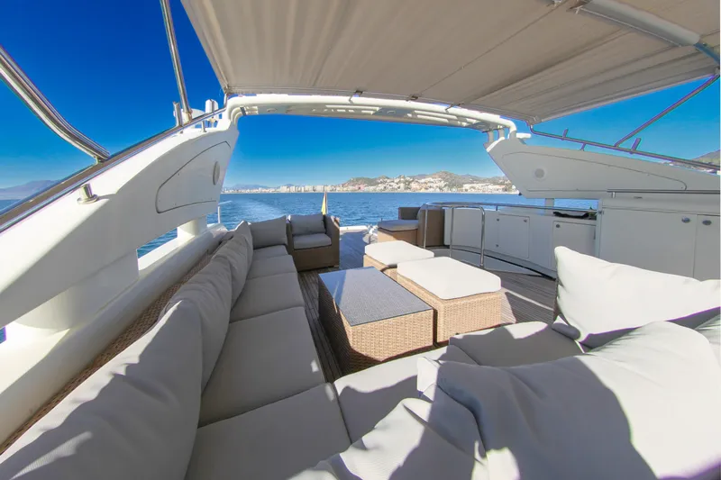 My Way Victoria Yacht Photos Pics Luxurious 2007 Dominator 860 Fly yacht interior with comfortable seating and ocean view.