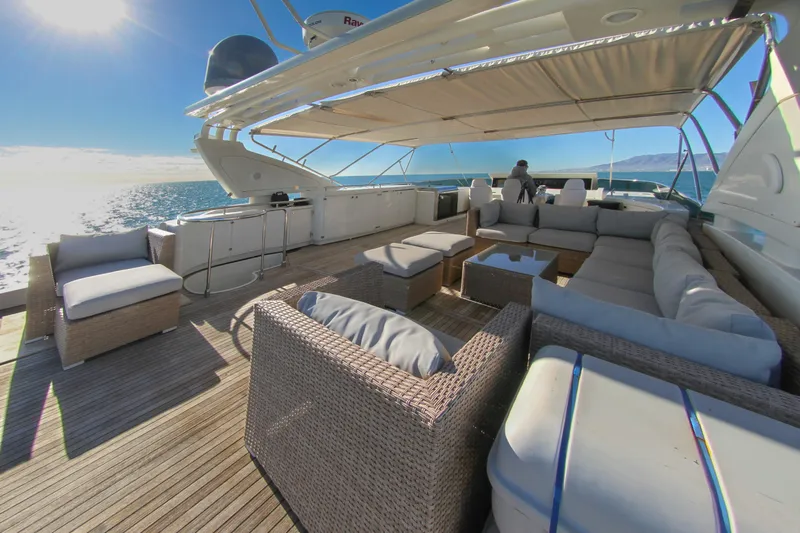 My Way Victoria Yacht Photos Pics Luxurious 2007 Dominator 860 Fly yacht deck with elegant seating and ocean view.