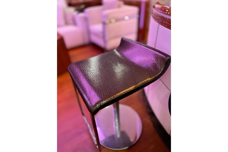 My Way Victoria Yacht Photos Pics Luxurious leather stool on Dominator 860 Fly yacht, 2007 model, with elegant interior design.