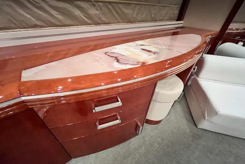 My Way Victoria Yacht Photos Pics Luxurious interior of 2007 Dominator 860 Fly yacht with elegant wood cabinetry.