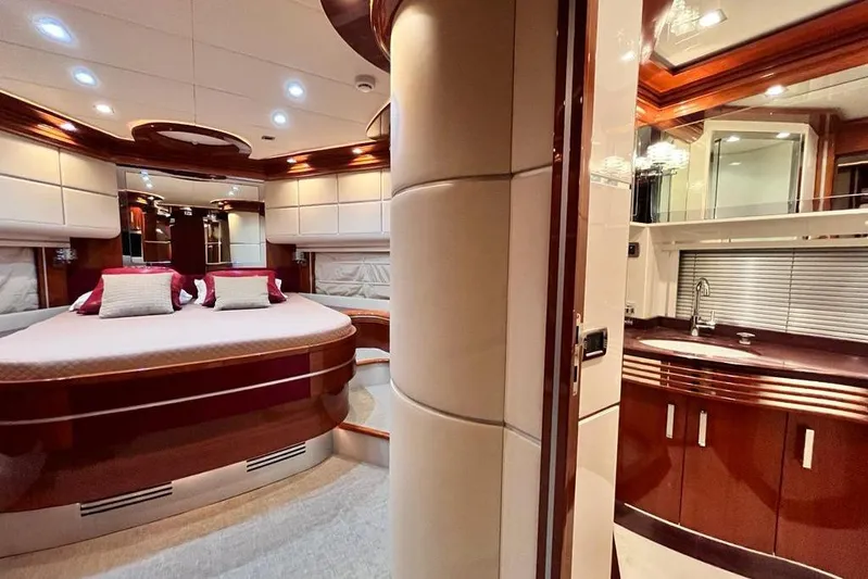 My Way Victoria Yacht Photos Pics Luxurious interior of 2007 Dominator 860 Fly yacht with elegant bedroom and bathroom.