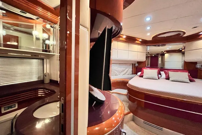 My Way Victoria Yacht Photos Pics Luxurious interior of 2007 Dominator 860 Fly yacht with elegant bedroom and bathroom.