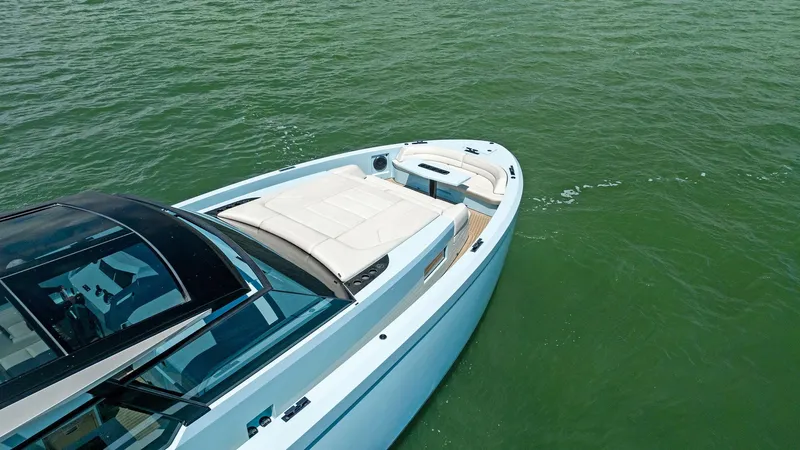 Shaloha Yacht Photos Pics 2022 Vanquish Yachts VQ58 luxury yacht on calm green waters.