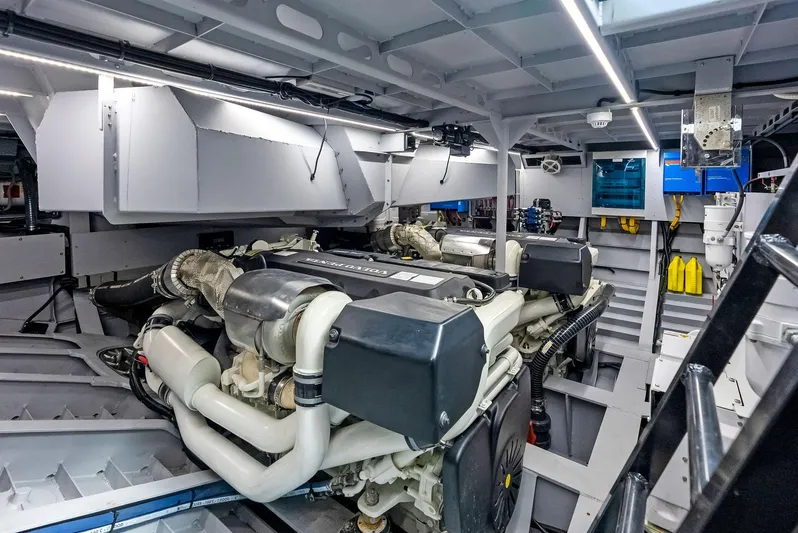 Shaloha Yacht Photos Pics Engine room of 2022 Vanquish Yachts VQ58 with modern equipment and lighting.