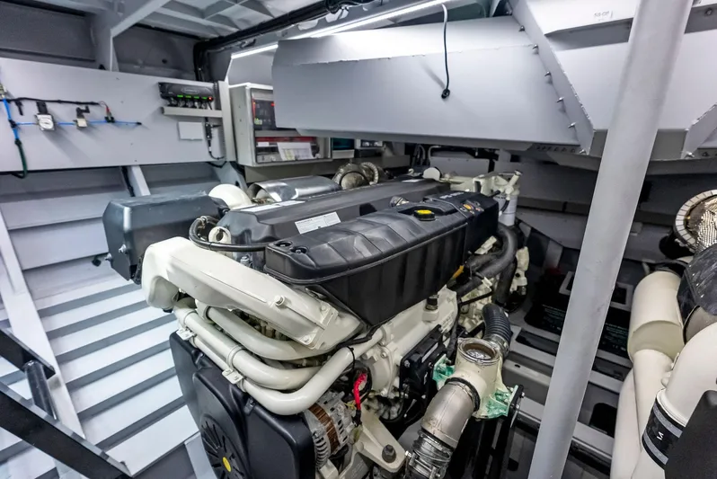 Shaloha Yacht Photos Pics Engine room of 2022 Vanquish Yachts VQ58, showcasing advanced marine engine.