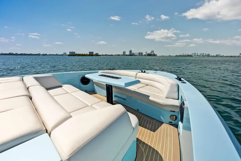 Shaloha Yacht Photos Pics 2022 Vanquish Yachts VQ58 luxury yacht with spacious seating and scenic ocean view.