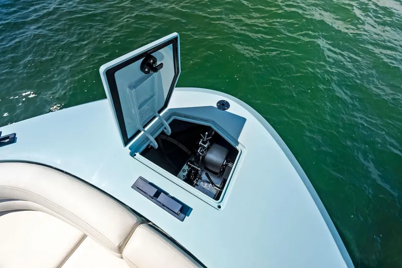 Shaloha Yacht Photos Pics Open hatch on the 2022 Vanquish Yachts VQ58, revealing storage compartment.