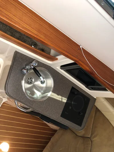  Yacht Photos Pics 2009 Grady-White CHESAPEAKE boat interior with sink and stove.