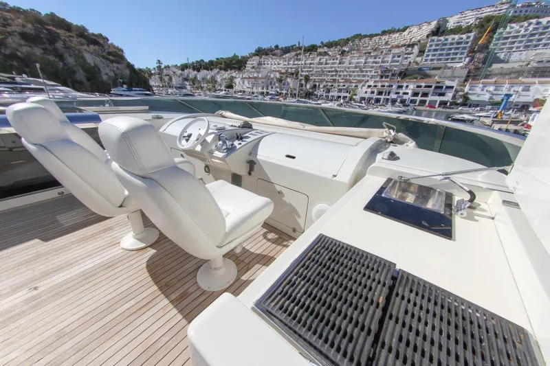 My Way Victoria Yacht Photos Pics Luxury yacht deck with helm, grill, and seating; Dominator 860 Fly, 2007 model.