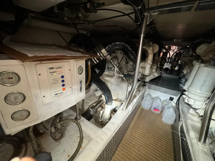  Yacht Photos Pics Engine room of a 2001 Ocean Yachts 48, featuring machinery and equipment.