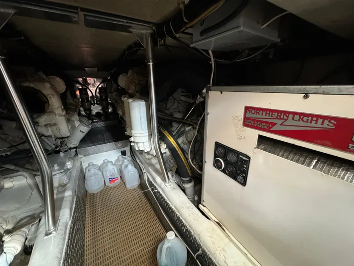  Yacht Photos Pics Engine room of a 2001 Ocean Yachts 48, featuring Northern Lights generator and equipment.