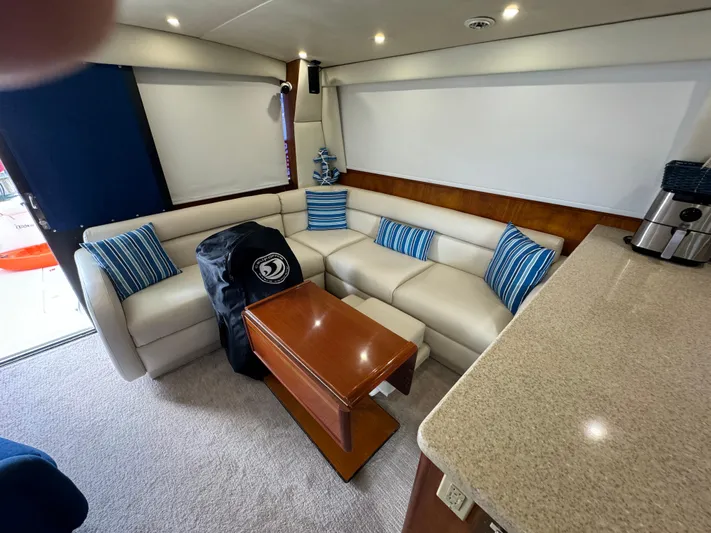  Yacht Photos Pics Luxurious interior of 2001 Ocean Yachts 48 with plush seating and modern decor.