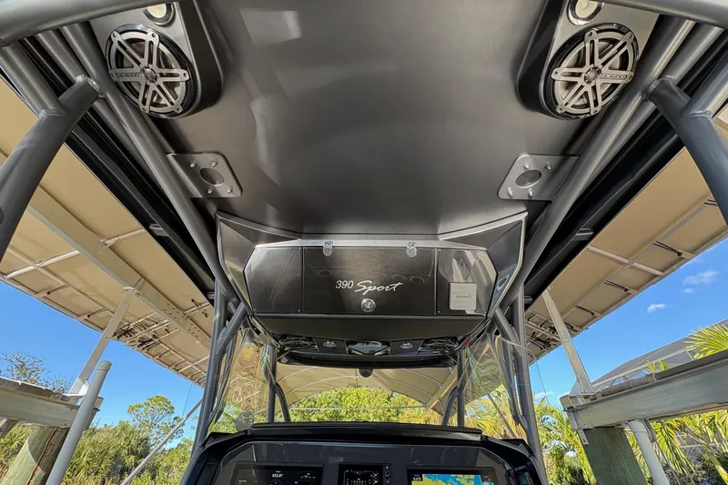  Yacht Photos Pics 2017 Nor-Tech 390 Sport Center Console interior with speakers and navigation equipment.