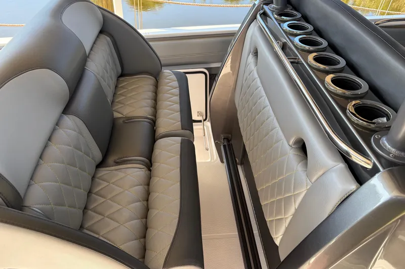  Yacht Photos Pics Luxurious seating on 2017 Nor-Tech 390 Sport Center Console with quilted upholstery and cup holders.