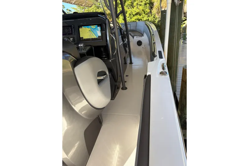  Yacht Photos Pics 2017 Nor-Tech 390 Sport Center Console boat interior with navigation display.