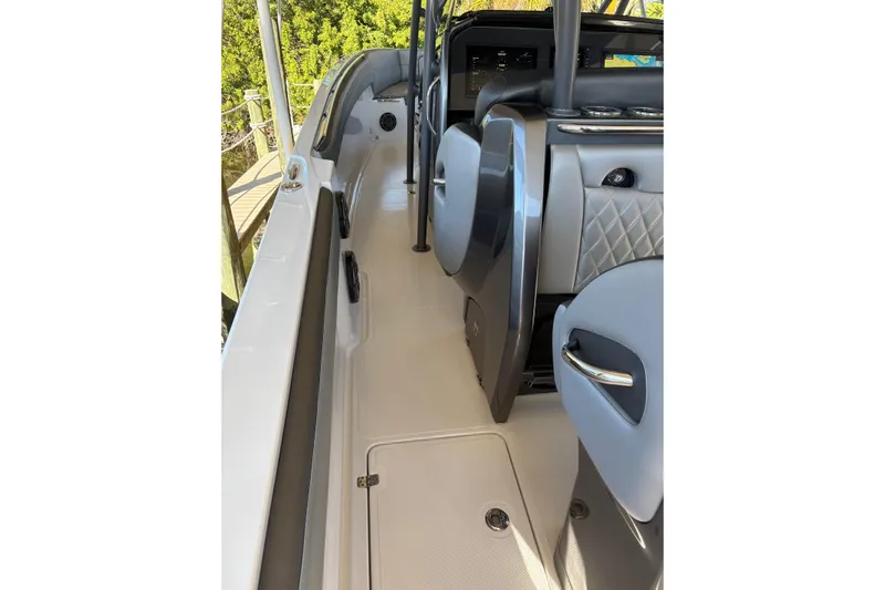 Yacht Photos Pics 2017 Nor-Tech 390 Sport Center Console interior with sleek seating and modern dashboard.