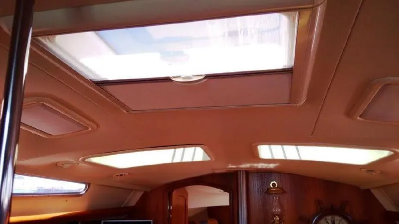 Elendil 1 Yacht Photos Pics Main cabin portlights and hatches with shades and bug screens