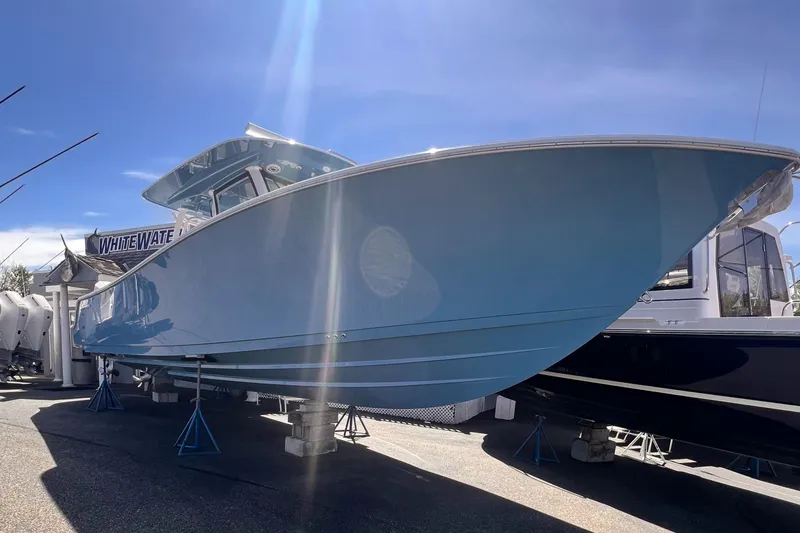  Yacht Photos Pics 2025 Sportsman Open 352 Center Console boat displayed outdoors under clear sky.