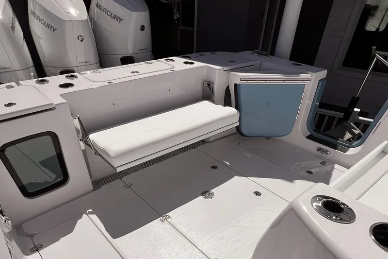  Yacht Photos Pics 2025 Sportsman Open 352 Center Console boat interior with seating and storage compartments.