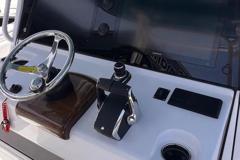  Yacht Photos Pics 2025 Sportsman Open 352 Center Console helm with steering wheel and controls.