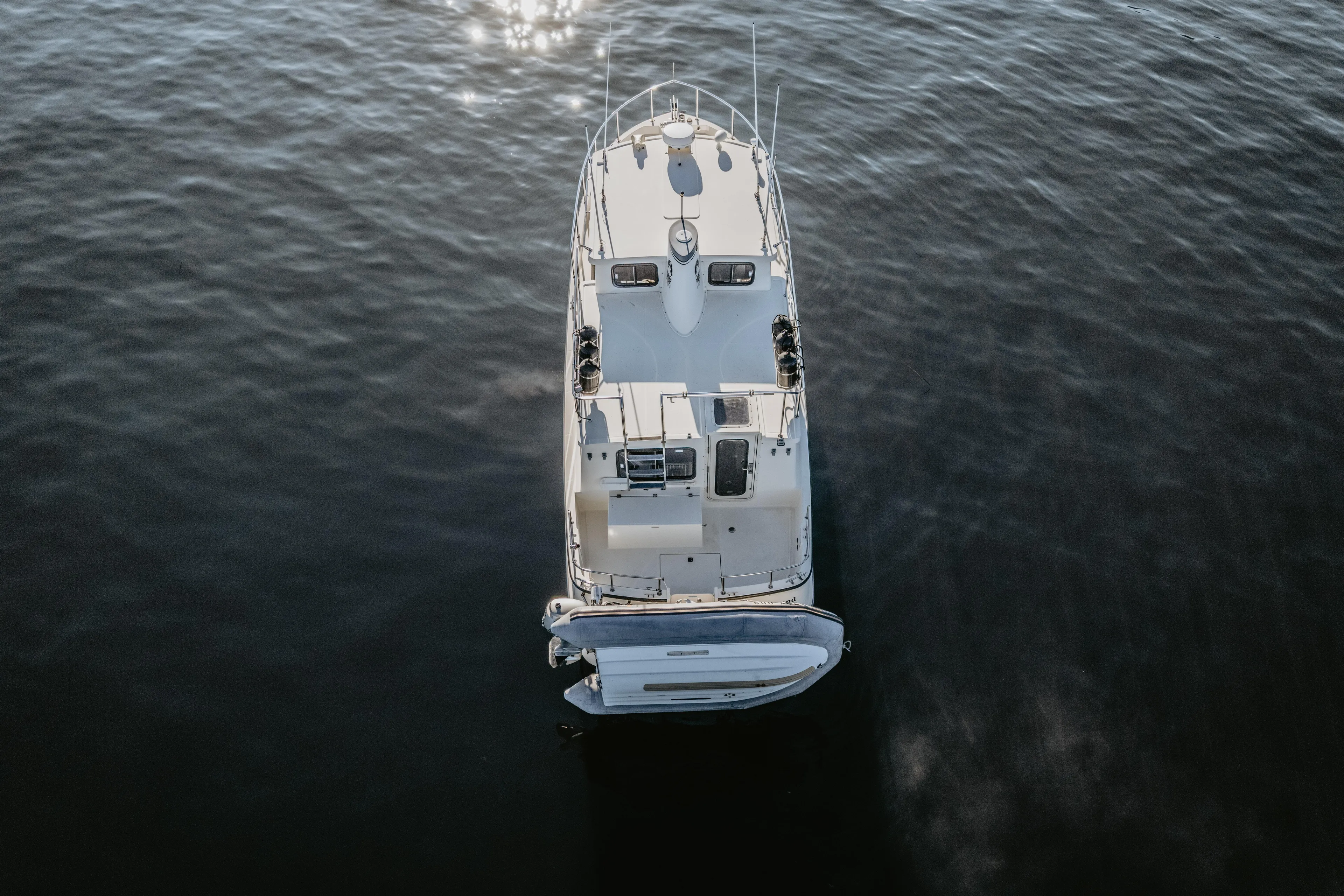 Old Bro Yacht Photos Pics Aerial view of 2001 Nordic Tug 32 boat on calm water.