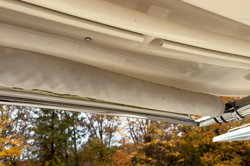  Yacht Photos Pics 2017 Grady-White Freedom 307 boat canopy detail with autumn trees in background.