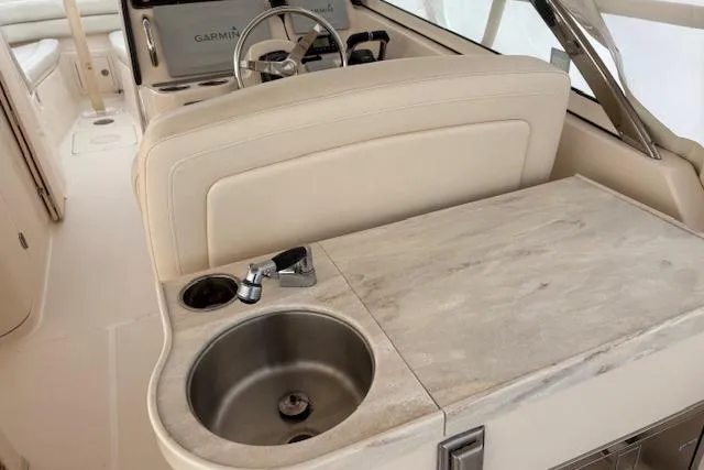  Yacht Photos Pics 2017 Grady-White Freedom 307 boat interior with sink and countertop.