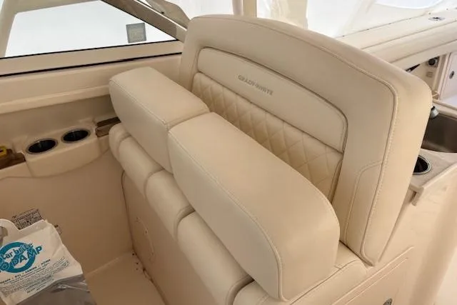  Yacht Photos Pics 2017 Grady-White Freedom 307 boat interior with beige leather seating.