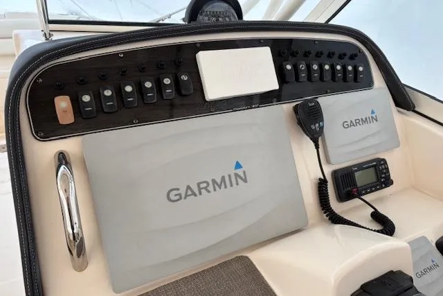  Yacht Photos Pics Control panel of 2017 Grady-White Freedom 307 boat with Garmin navigation system.