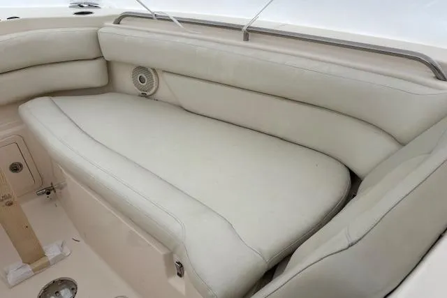  Yacht Photos Pics 2017 Grady-White Freedom 307 boat interior with cushioned seating and speaker.