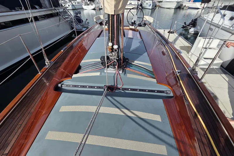 Blue Star Yacht Photos Pics 2018 Tofinou 12 sailboat deck with sleek wood finish and modern rigging.
