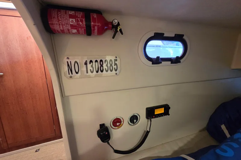 Blue Star Yacht Photos Pics Interior of a 2018 Tofinou 12 boat with fire extinguisher and equipment.