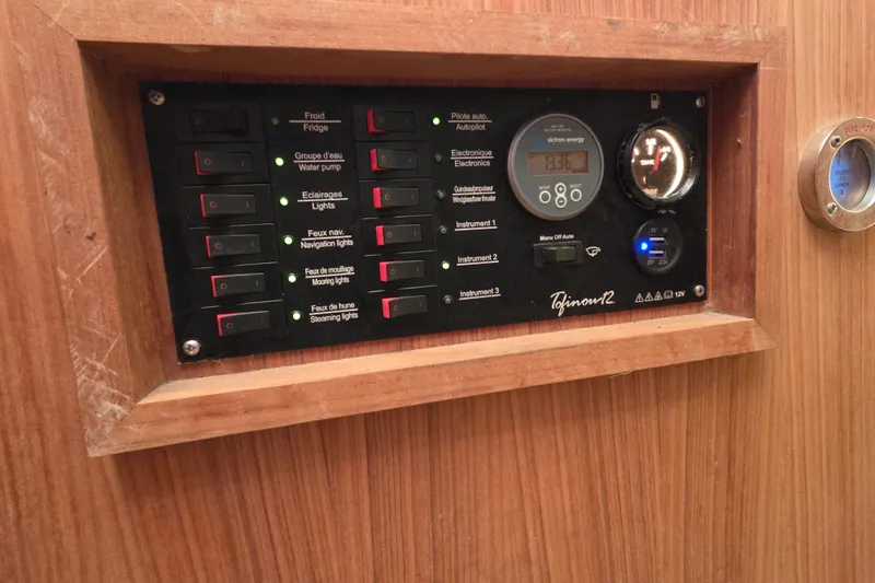 Blue Star Yacht Photos Pics Control panel of a 2018 Tofinou 12 yacht with various switches and gauges.