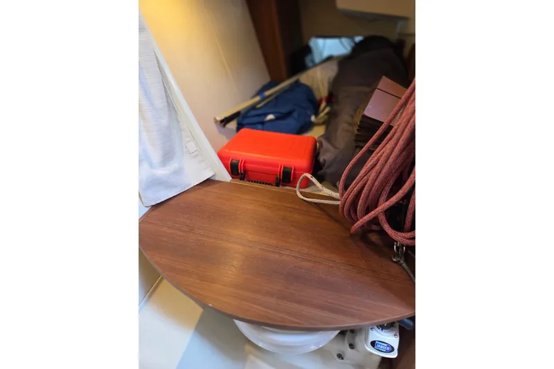 Blue Star Yacht Photos Pics Interior of 2018 Tofinou 12 sailboat with ropes and storage items.