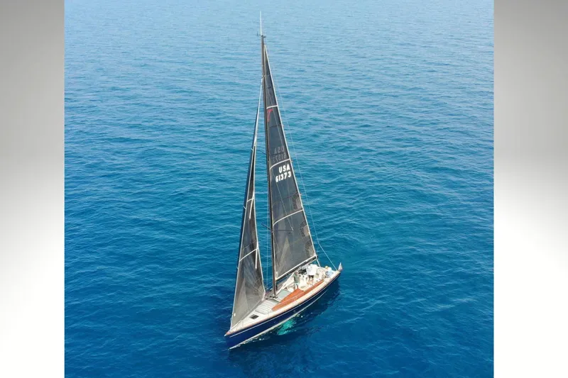 Blue Star Yacht Photos Pics Aerial view of 2018 Tofinou 12 sailboat on open blue sea.