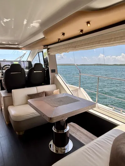  Yacht Photos Pics Luxurious interior of 2023 Azimut Fly 60 yacht with ocean view.